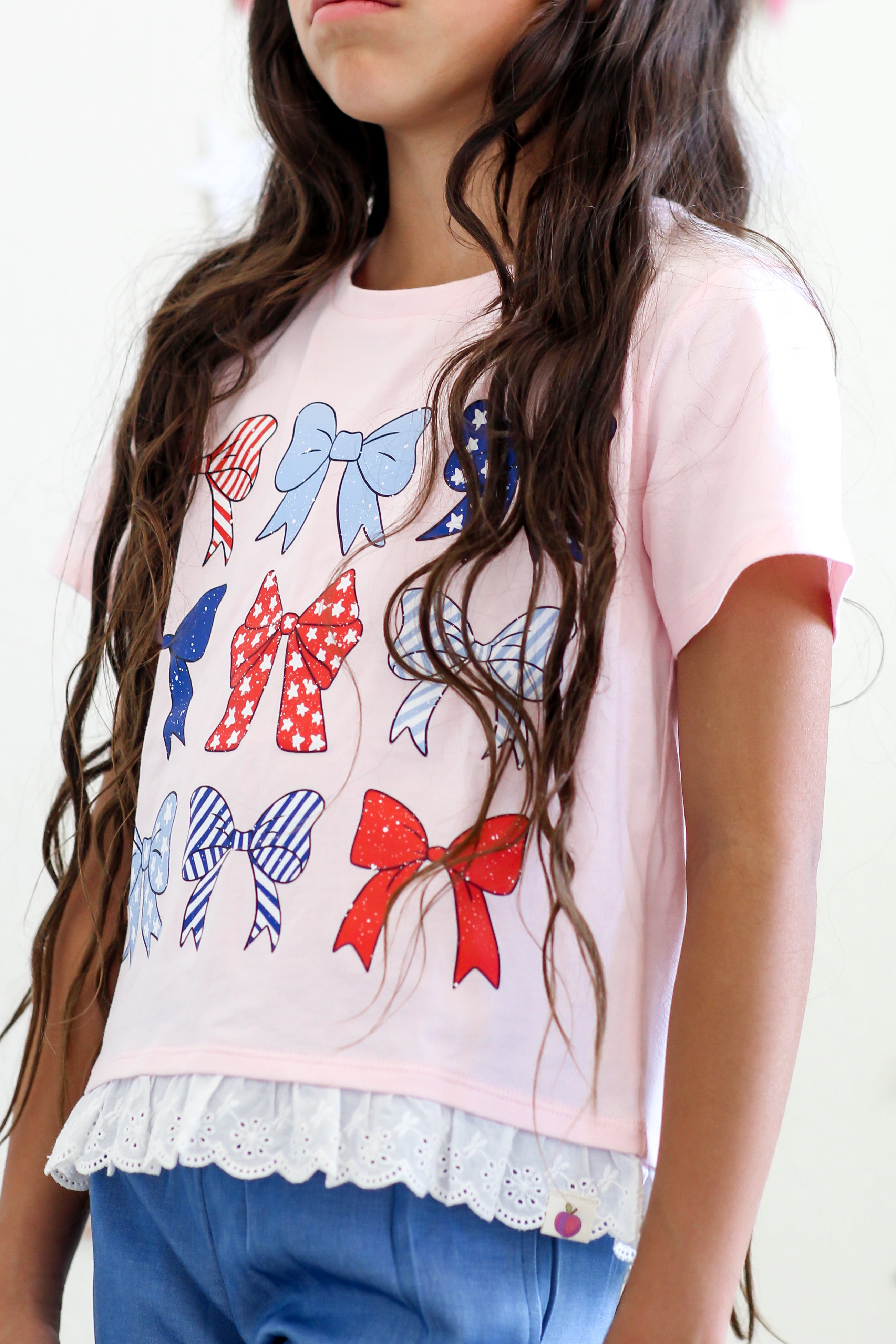 Graphic Ruffle Hem Tee - Bow-tiful Liberty