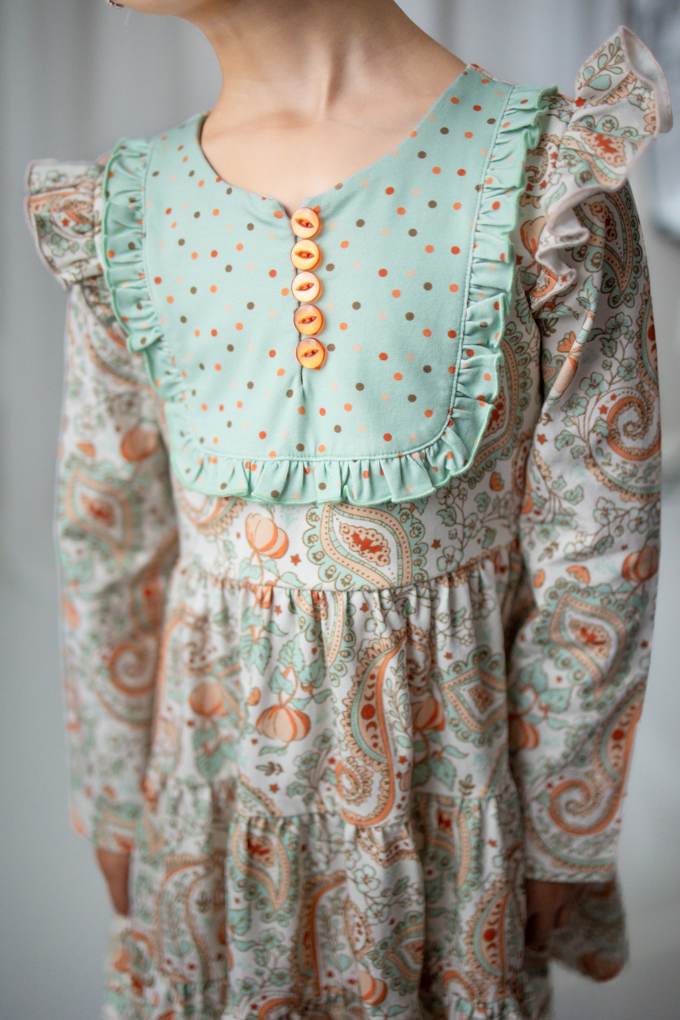 Annistyn Bib Dress -Paisley Pumpkin Delight